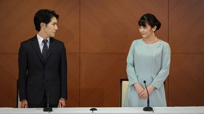 Princess Mako, the elder daughter of Prince Akishino and Princess Kiko, and her husband Kei Komuro, a university friend of Princess Mako, poses during a press conference to announce their wedding at Grand Arc Hotel on October 26, 2021 in Tokyo, Japan.