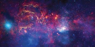 A purple, blue and other brightly colored view of the Galactic Center.