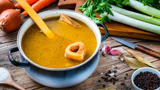 bone broth being made in a pan