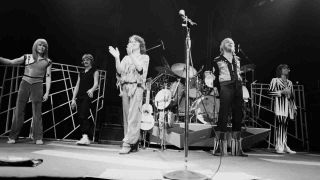 Yes performing onstage in 1977