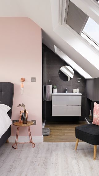 pink and grey loft conversion bedroom with en suite