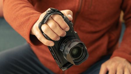 The Peak Design Field Bracket being used by a photographer