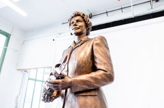 A new statue of Native American engineer Mary Golda Ross depicts the Native American engineer holding an Atlas-Agena model and a slide rule wrapped in a scroll engraved with the equation that describes the energy needed for a spacecraft to depart Earth and reach the orbit of another planet.