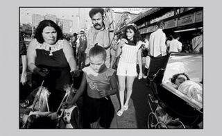 'A family walks along the crowded...' by Bruce Gilden, 1988, Coney Island, New York