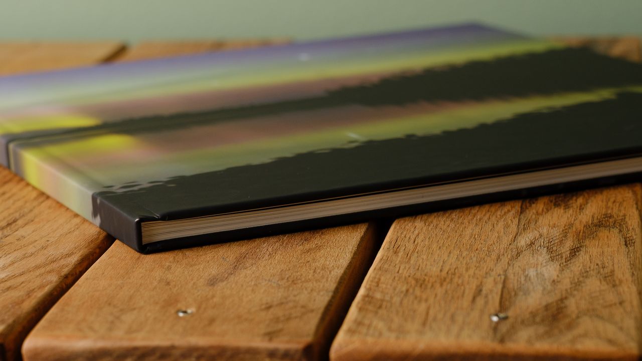 Photo books from Saal on a desktop