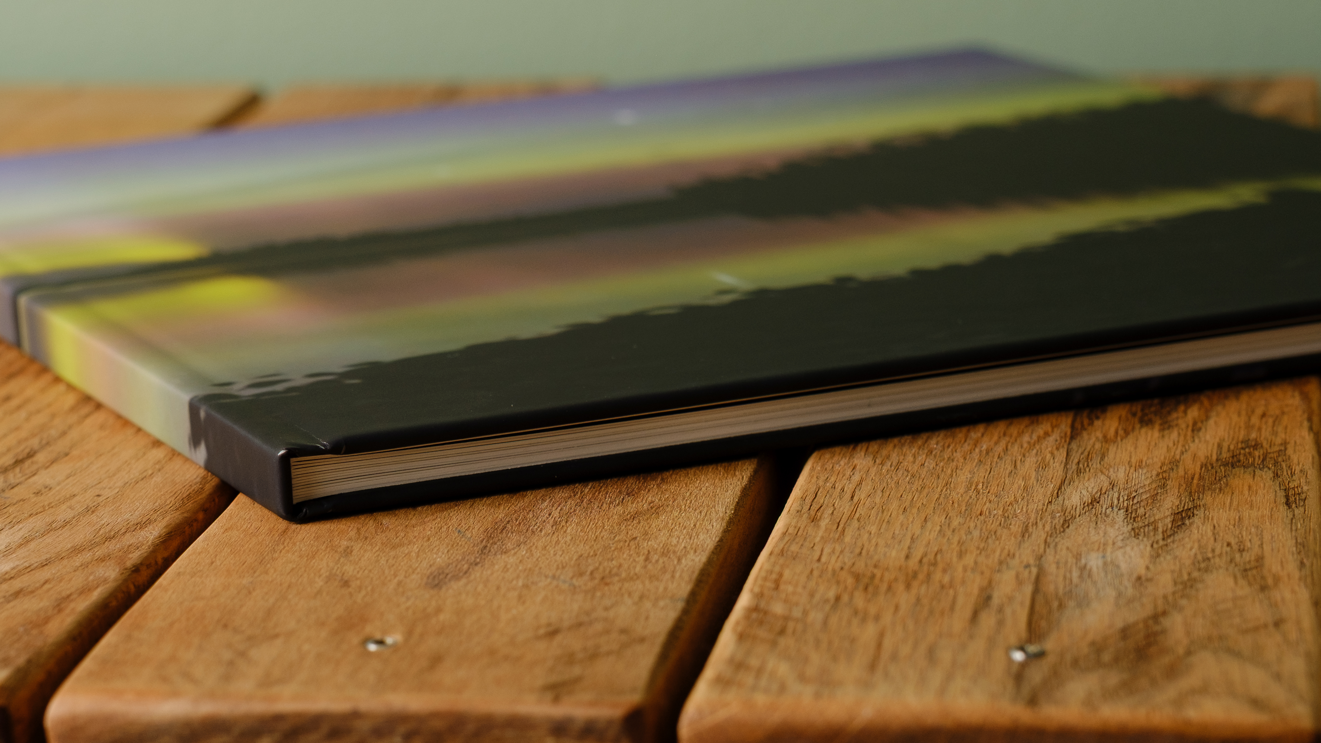 Photo books from Saal on a desktop