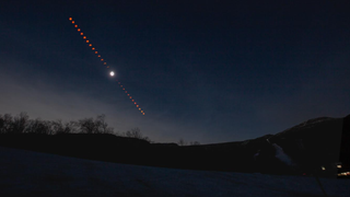 A sequence of images show the eclipse through different phases as the sun travels through the sky with a mountain silhouetted in the foreground.