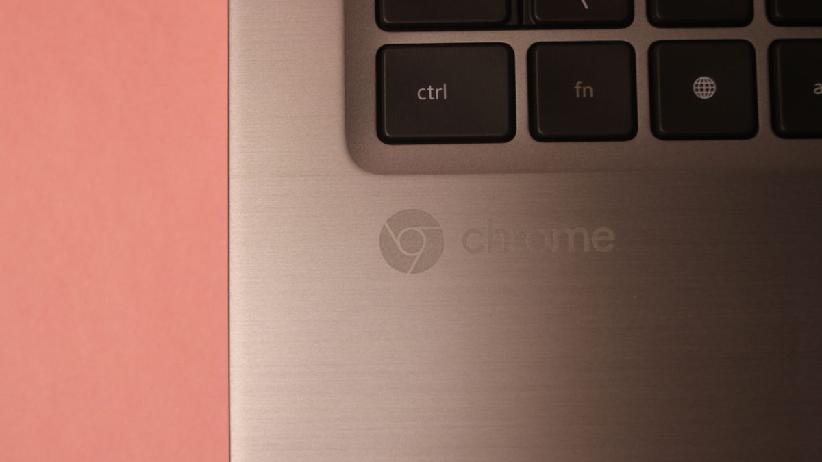 Dell&amp;#039;s Latitude Chromebook with a close up of the &amp;#039;Chrome&amp;#039; logo