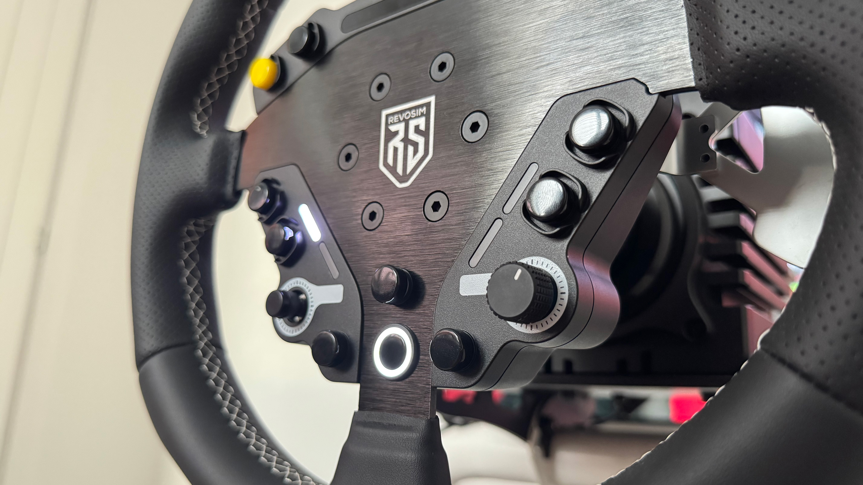 A close-up shot of the Nacon Revosim RS Pure bundle&#039;s steering wheel