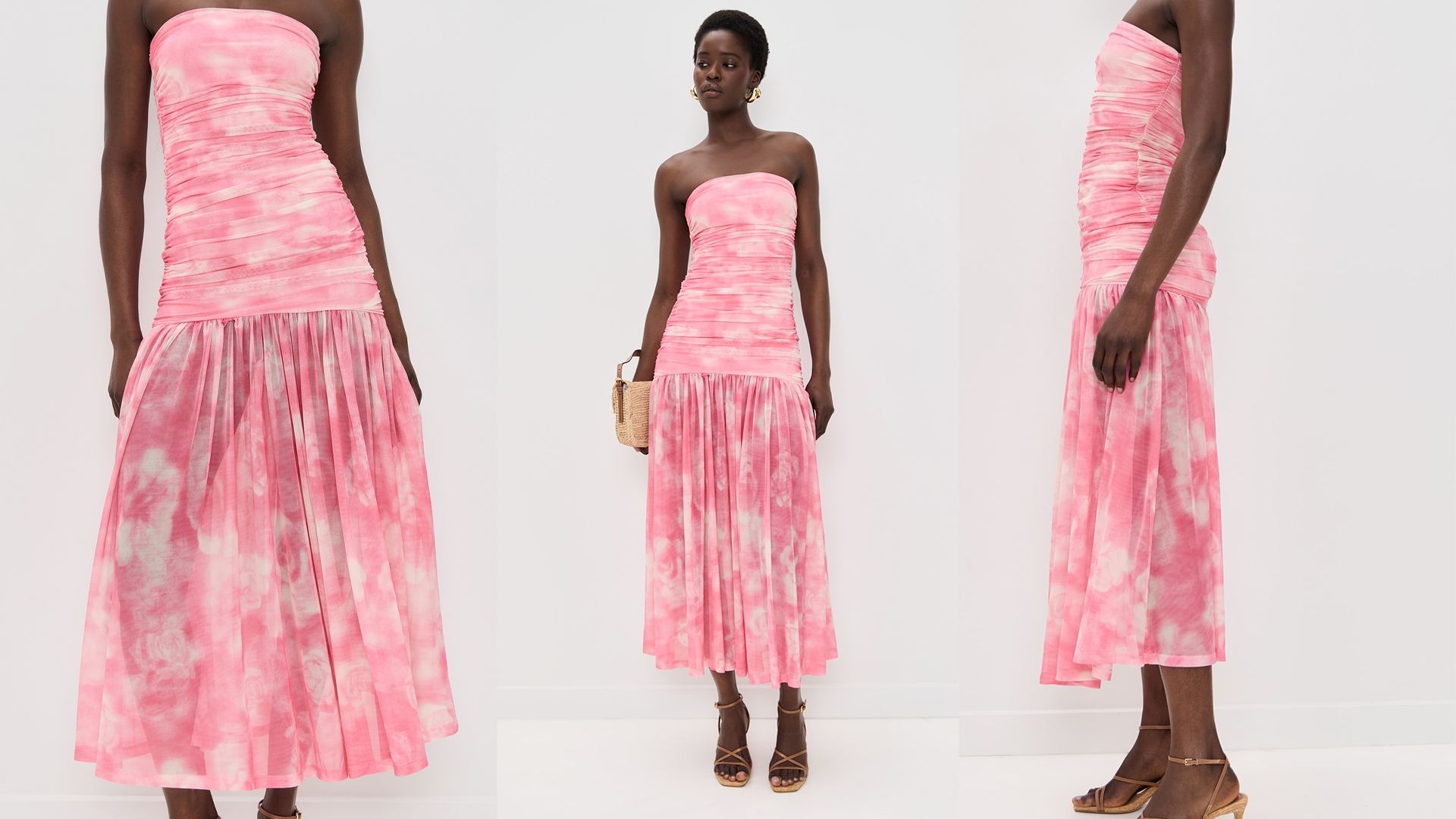 model wears pink and white drop waist dress and heels