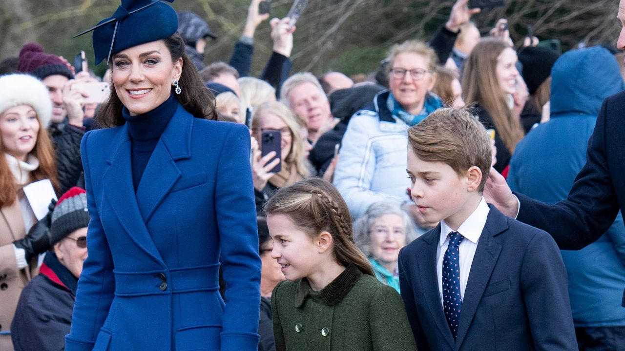 Catherine, Princess of Wales (L) with Prince George of Wales (R) and Princess Charlotte of Wales (C) attend the Christmas Day service 