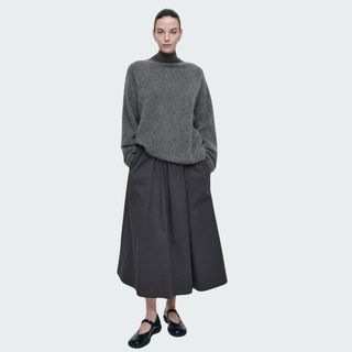 flat lay image of black skirt 