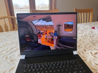 Alienware X16 R2 sitting on a kitchen table