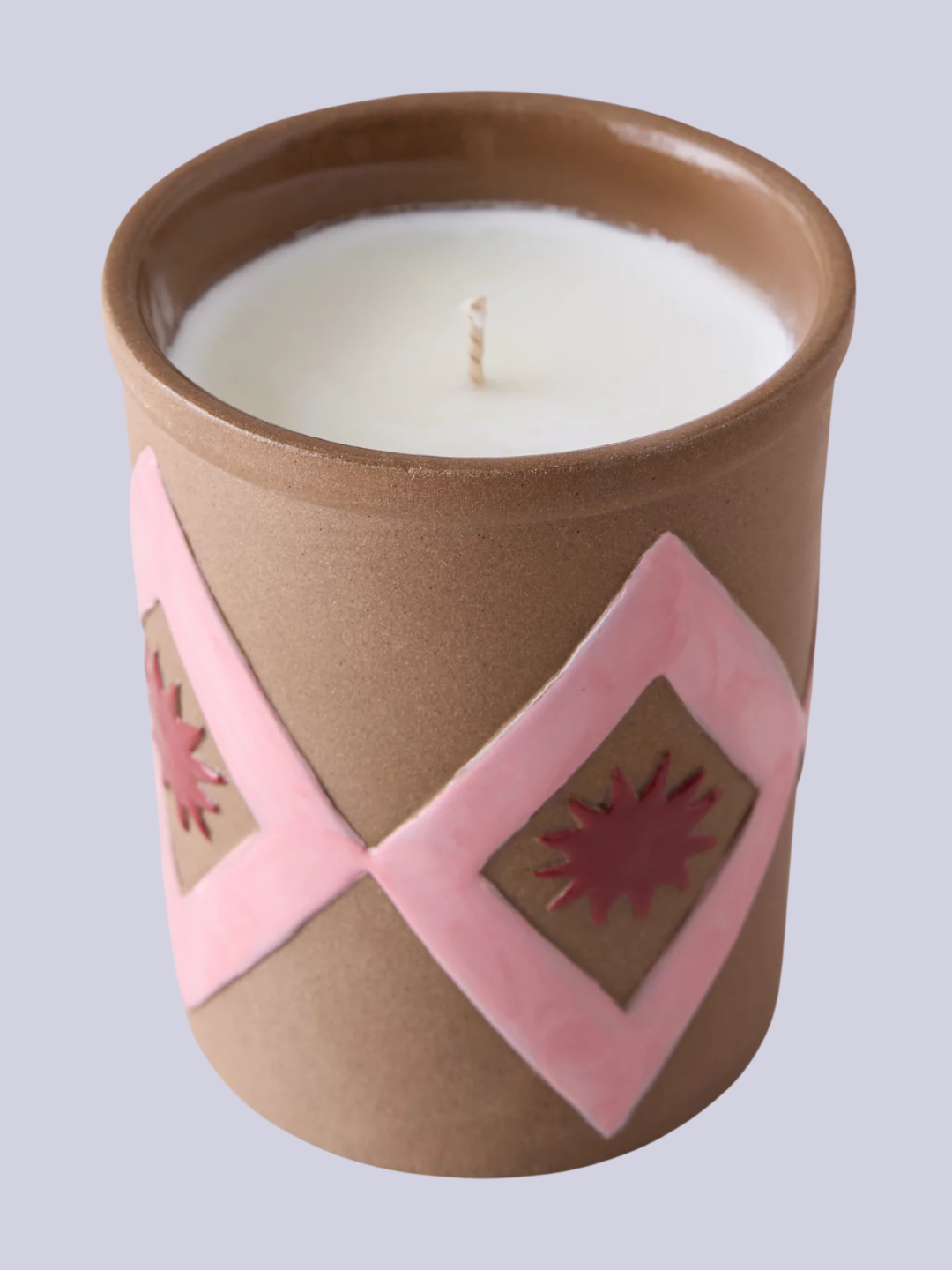 A brown scented candle from M&amp;AElig;GEN