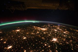 Lightning and Aurora Borealis as Seen from ISS
