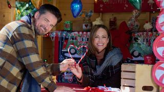 Warren Christie, Nikki DeLoach in Our Holiday Story