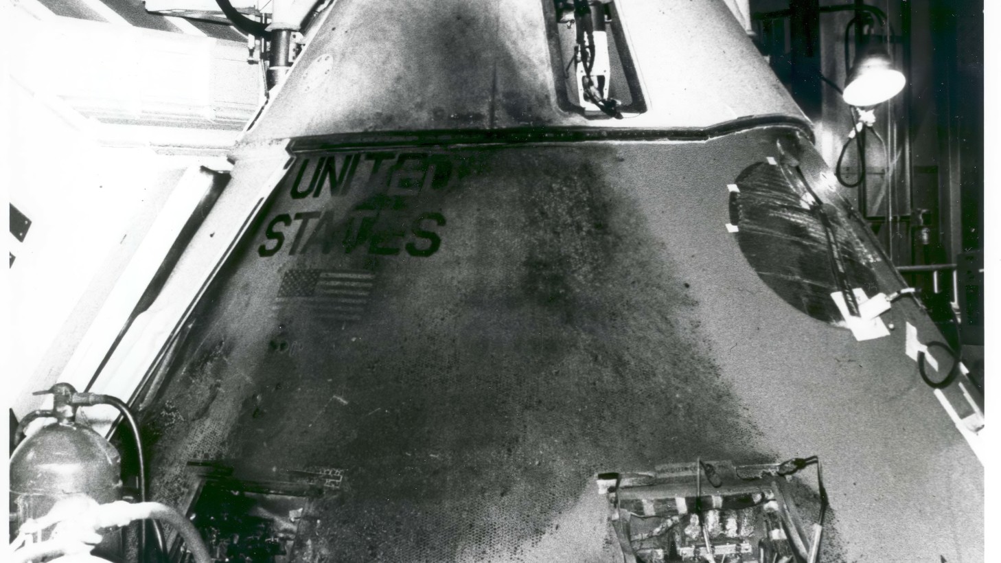 Image showing the damaged Apollo 1 spacecraft following the flash fire that killed all astronauts onboard during a simulated launch