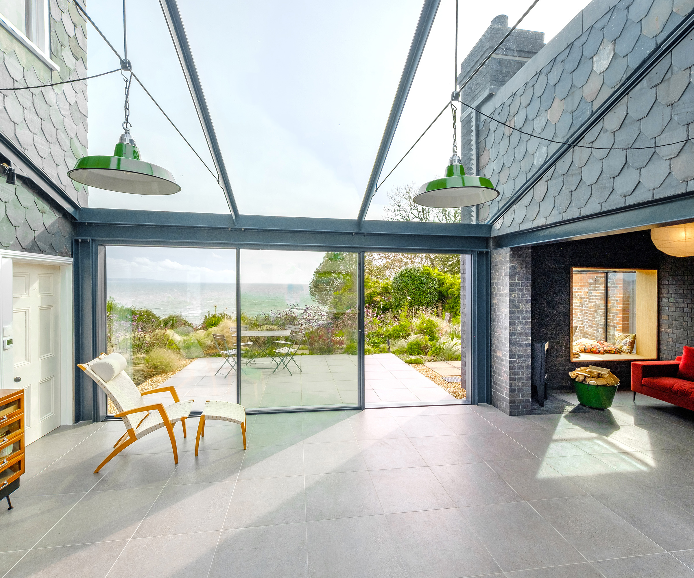 Glass roof link extension with views out to sea