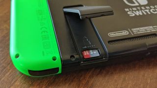 MicroSD card in Nintendo Switch under kickstand.
