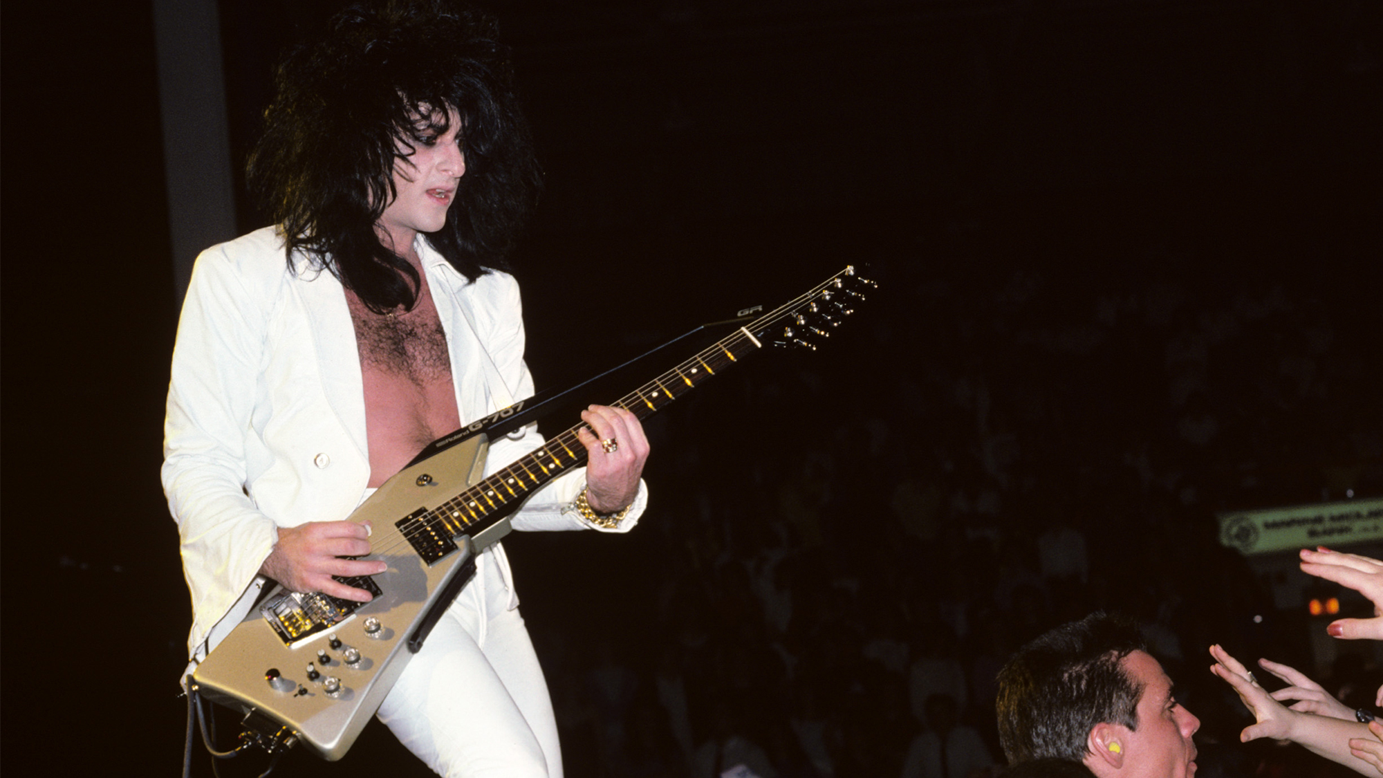 Steve Stevens performs onstage playing the Roland GR-707 guitar synthesizer, 12 April, 1987