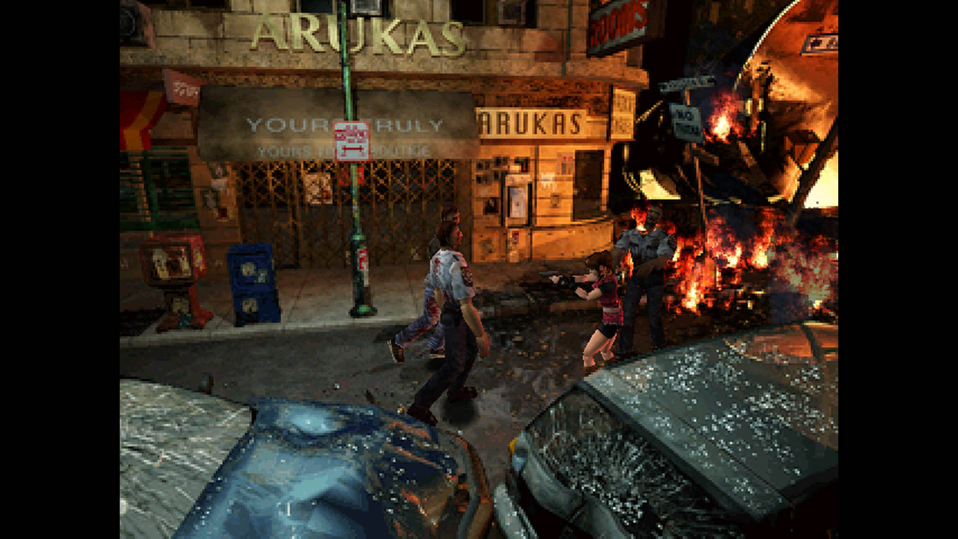 Claire Redfield keeps zombies at bay in Resident Evil 2 for the PC in the streets of Raccoon City, some of which are on fire