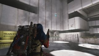 Arc Raiders Camera Lens: A player looking at the Security Office in the Stella Montis Lobby, next to the train station.