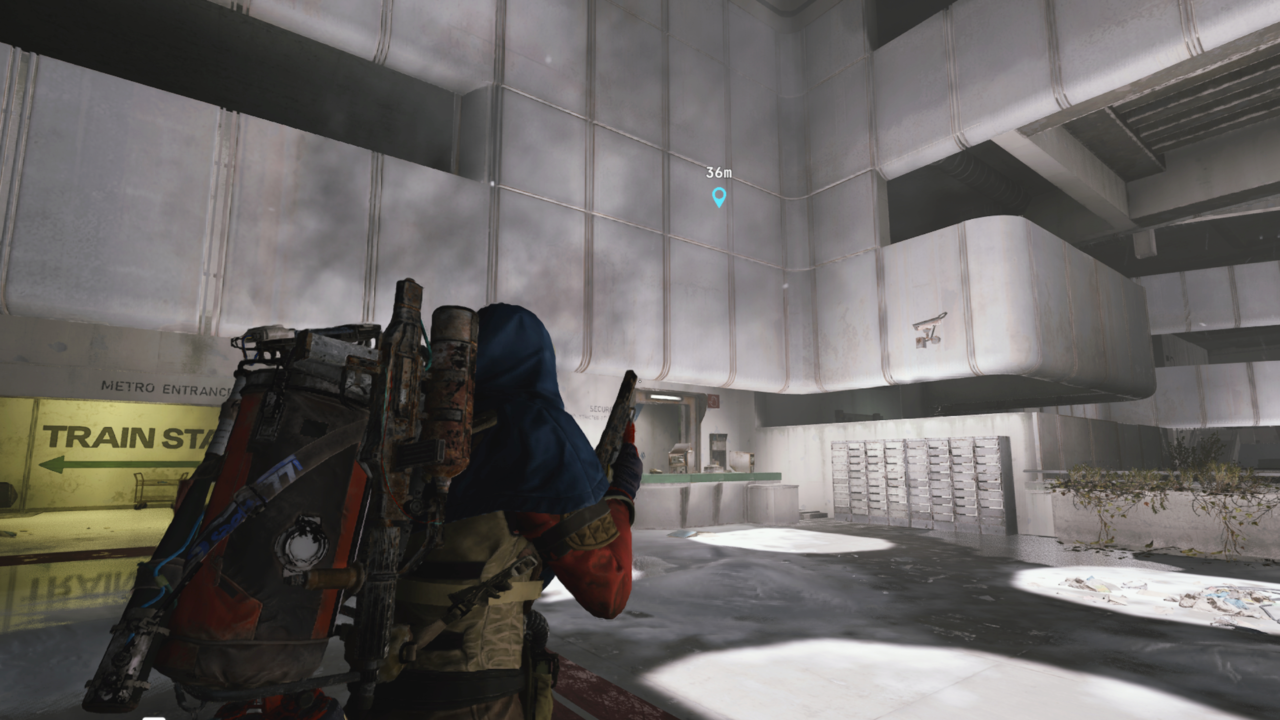 Arc Raiders Camera Lens: A player looking at the Security Office in the Stella Montis Lobby, next to the train station.