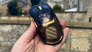 Asus ROG Harpe II Extreme Edition 20 in a hand, from the back