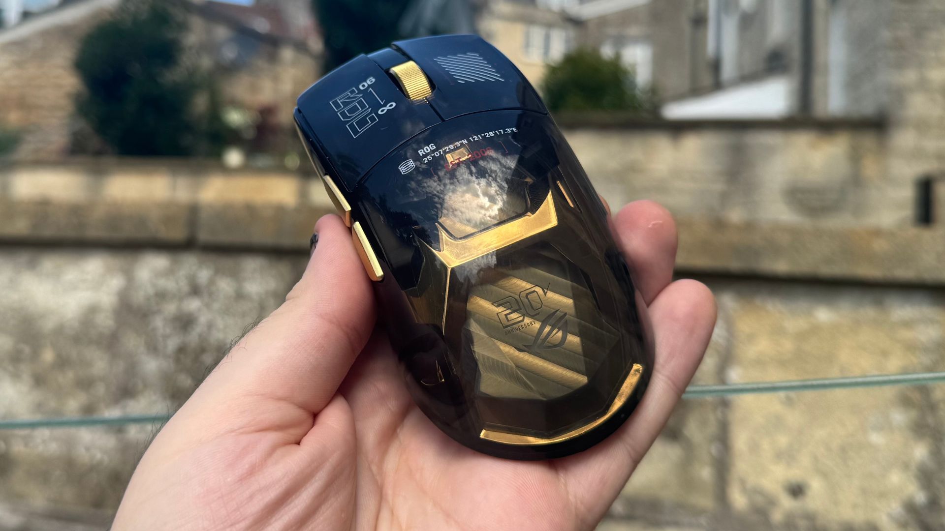 Asus ROG Harpe II Extreme Edition 20 in a hand, from the back