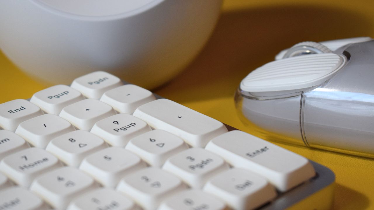 Lofree Flow mechanical wireless keyboard photograph showing low-profile number pad close up