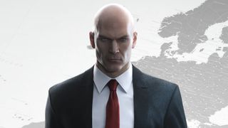 Cropped in key art of Agent 47 for Hitman 2016, showing him suited in front of a world map