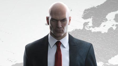 Cropped in key art of Agent 47 for Hitman 2016, showing him suited in front of a world map