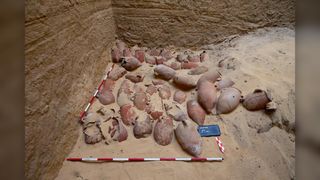 The team discovered hundreds of pottery vessels in the cache.