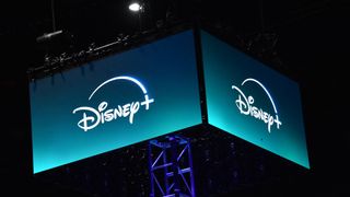 Disney Plus logo and branding pictured on a screen at San Diego Comic-Con International at the San Diego Convention Center in San Diego, California, on July 24, 2024.