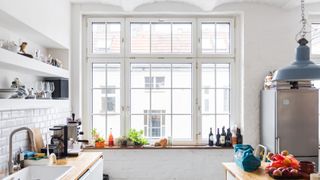 windows in a white kitchen