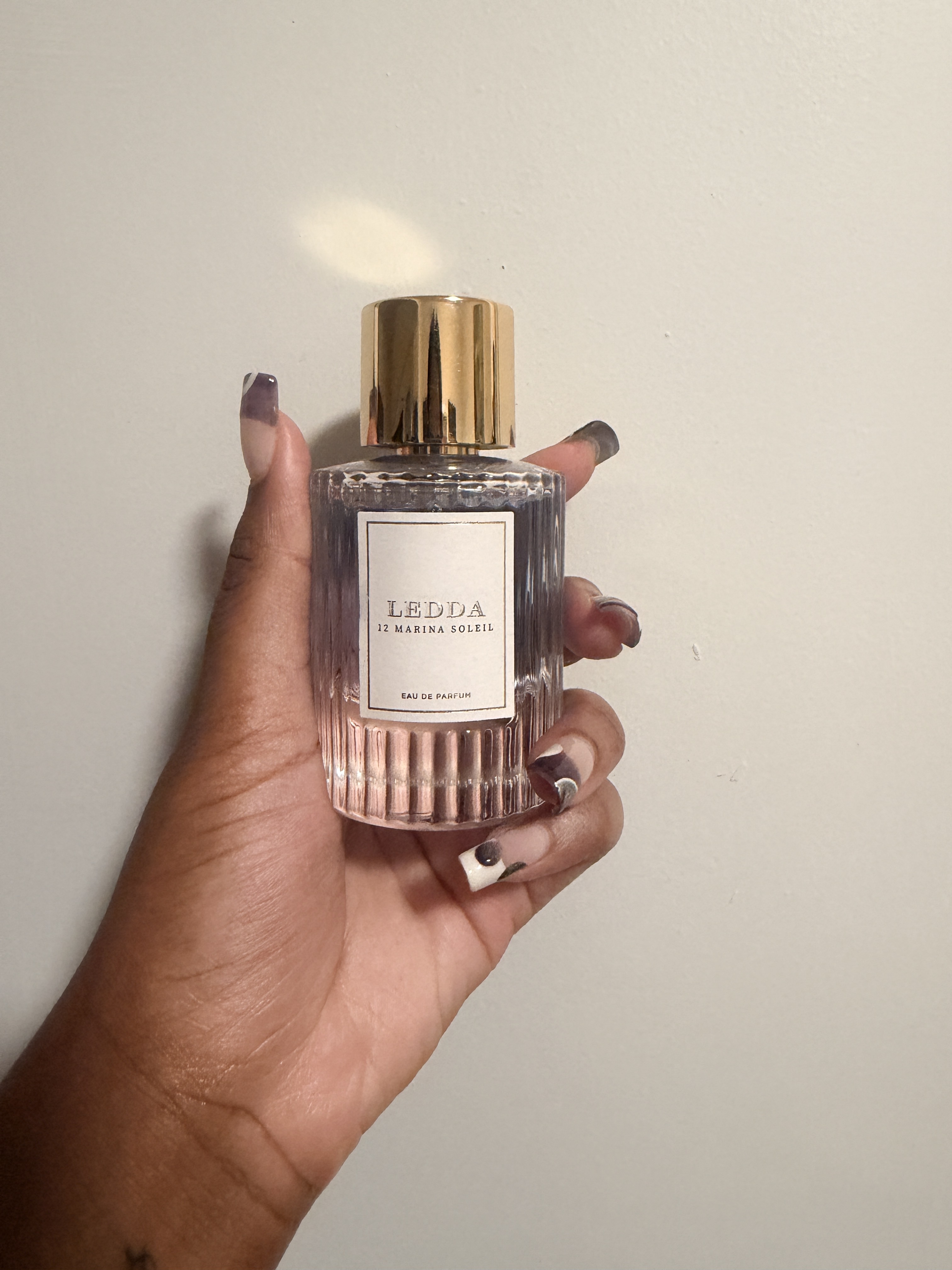 Ariel Baker testing Ledda's 12 Marina Soleil Eau de Parfum.