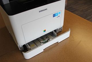 This printer’s primary paper tray holds 250-sheets of standard printer paper.