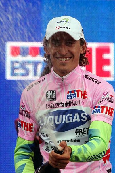 Pellizotti sprays the champagne and enjoys pink