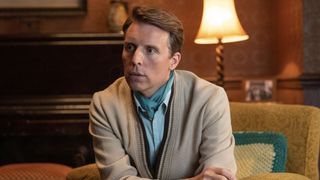 Christopher Harper in a beige cardigan and blue shirt as Geoffrey in Call the Midwife.
