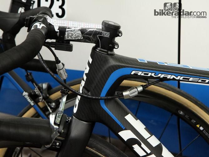 As John Degenkolb's (Giant-Shimano) brake calipers were adjusted on the wide rims with the quick-release in the open position, additional inline quick-releases are installed for faster wheel changes