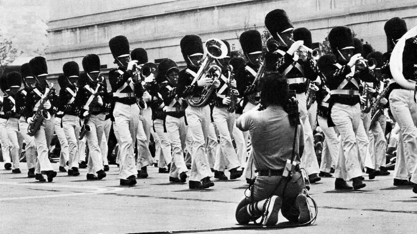 A contract cameraman covers the July 3 parade in Washington, D.C., from the sidelines. The parade marked the first time the author saw one of the (then)-new &lsquo;minicams&rsquo; in use.