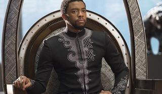 Black Panther Chadwick Boseman T'challa sits on his throne