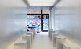 Essence Cuisine is fitted with benches along each wall, which are lined with cube tables