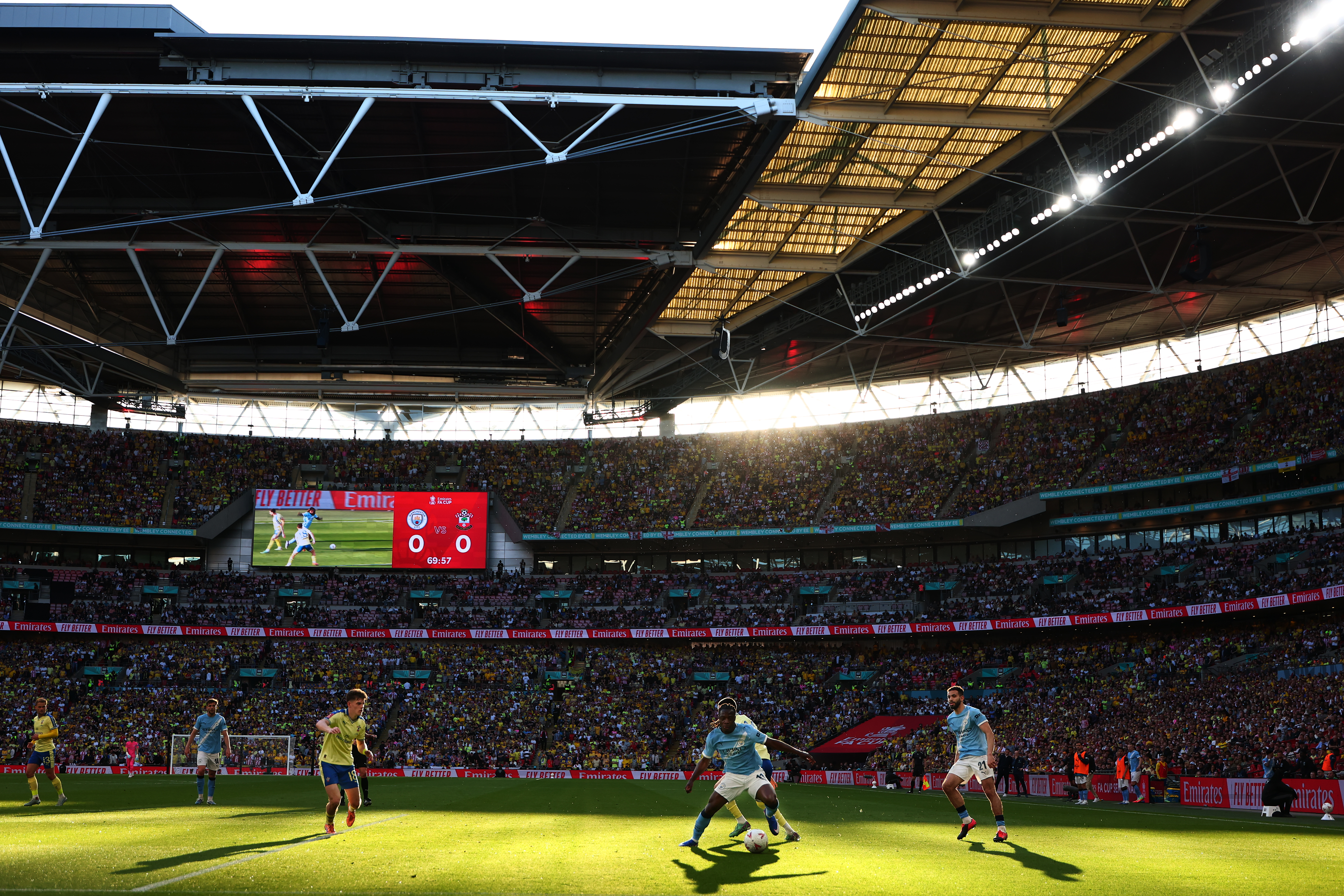 LONDON, ENGLAND - APRIL 25: Jeremy Doku of Manchester City takes on Finn Azaz of Southampton during the Emirates FA Cup Semi Final match between Manchester City and Southampton on April 25, 2026 in London, England. (Photo by Shaun Brooks - CameraSport via Getty Images)
