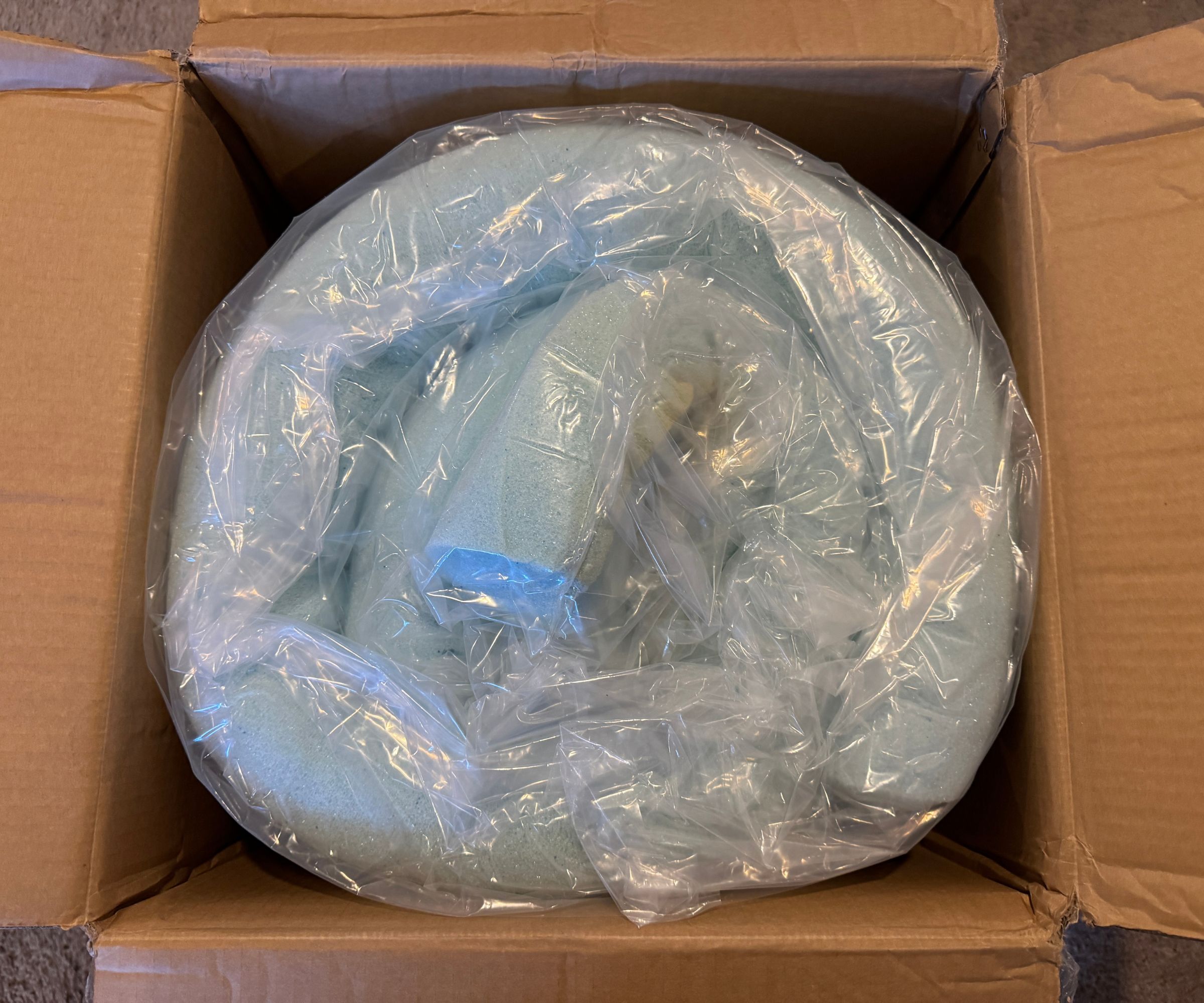 Lucid mattress topper being unboxed and tested for a review