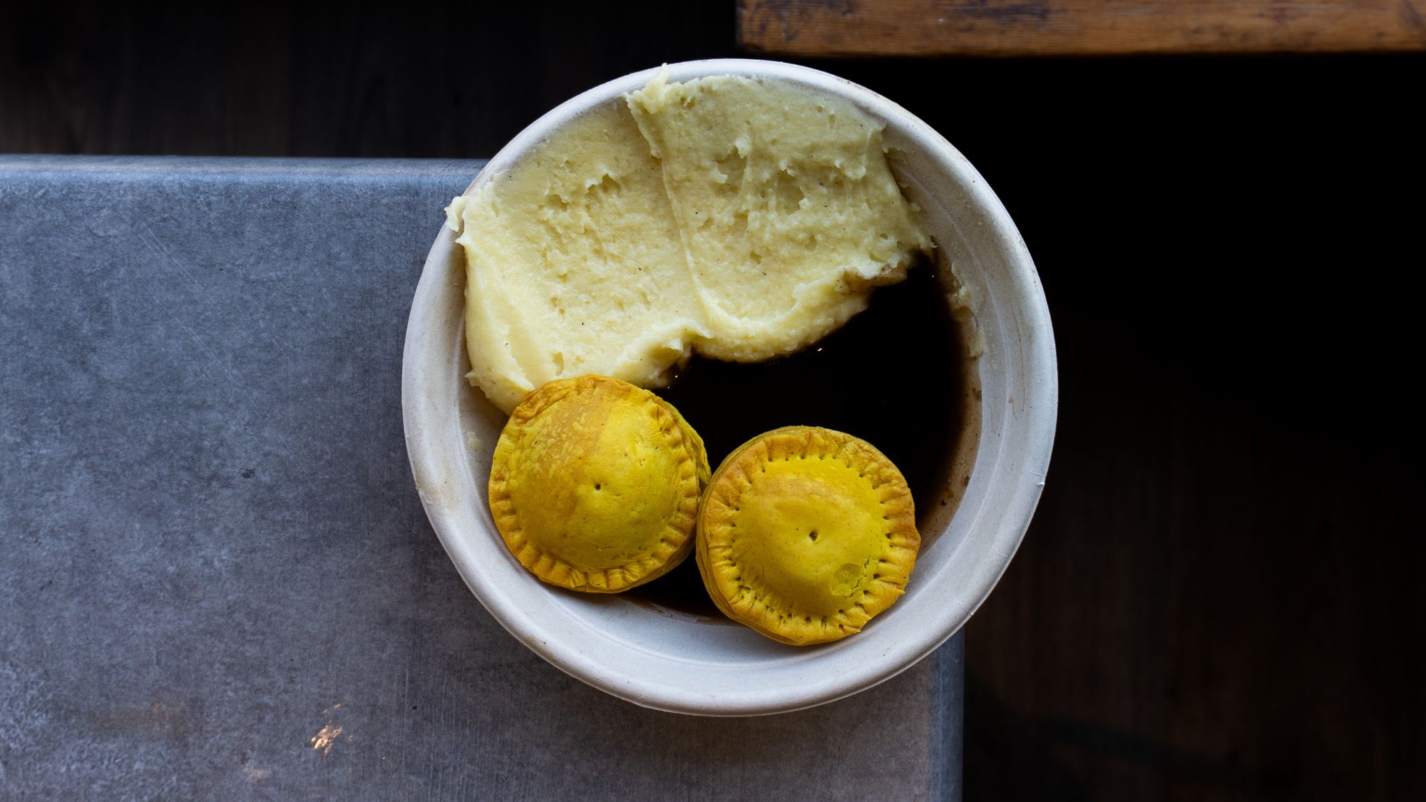 Beef patties with mashed potato and jerk gravy at Hoodwood, Kentish Town