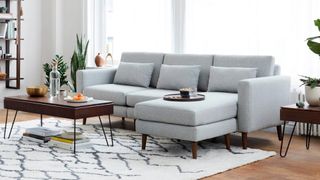 A grey chaise sofa in a modern living room