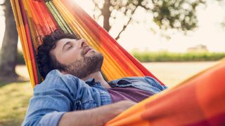 Man sleeping in a hammock