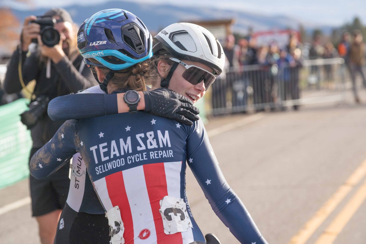 Isabella Holmgren and Clara Honsinger hug after the 2023 Pan American Cyclocross Championships