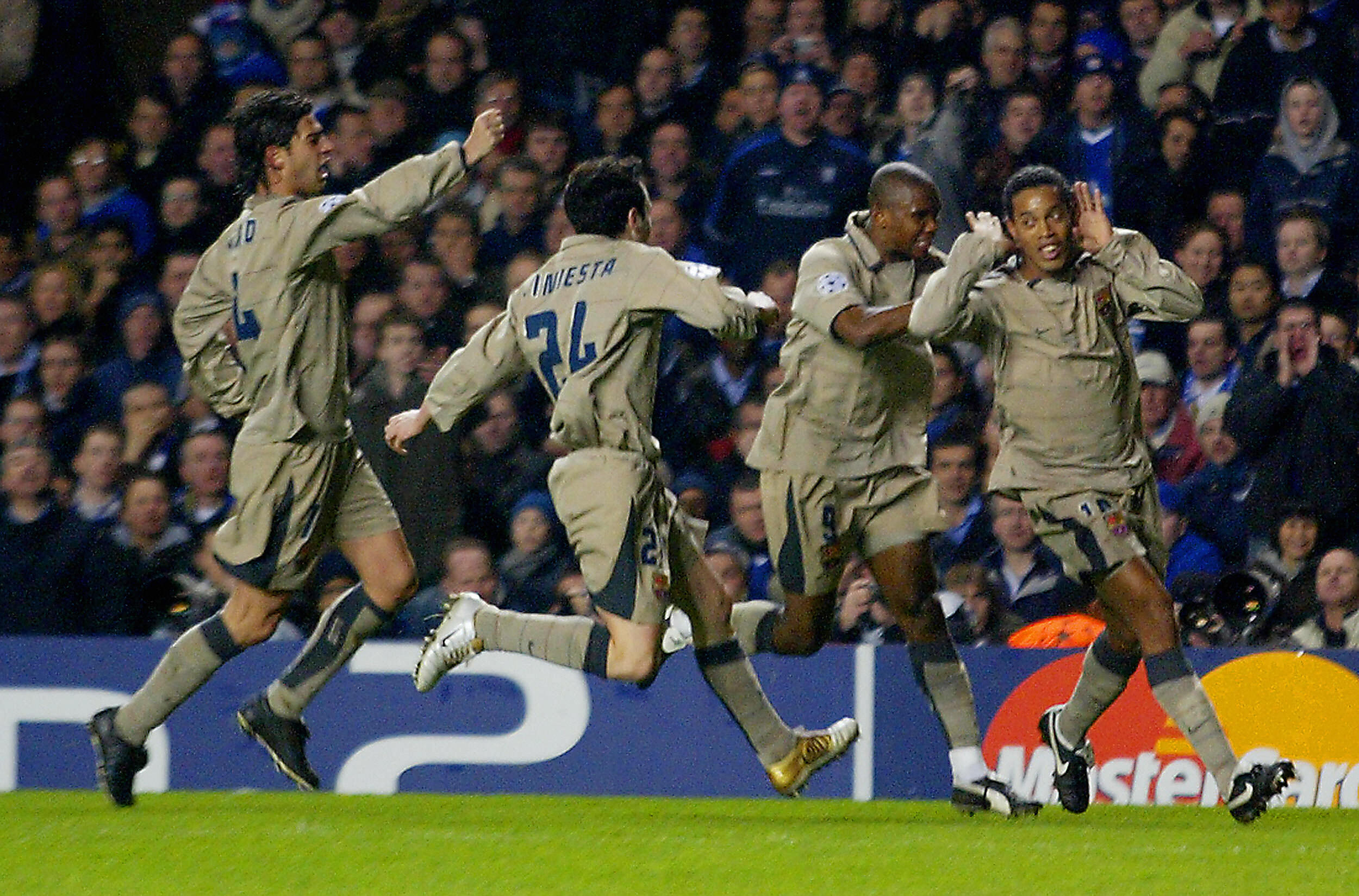 Ronaldinho celebrates his goal against Chelsea in 2005 with his Barcelona team-mates
